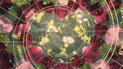 Astrologie-Spirale vor einem Herz aus Rosenblättern - Foto: Collage mit Fahad / AdobeStock & Paolo Gallo / AdobeStock