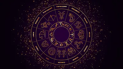 Goldener Sternzeichen Kreis mit Symbolen, Bildern und Namen vor einem dunklen Hintergrund - Foto: Hasti / AdobeStock