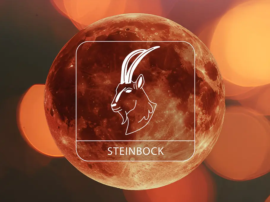 Sternzeichen Steinbock vor einem Blutmond umgeben von leuchtenden Kreisen