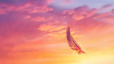 Eine Feder am Himmel gefärbt vom Sonnenuntergang - Foto: soem / AdobeStock