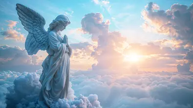 Engelstatue umgeben von Wolken - Foto: OpticalDesign / AdobeStock