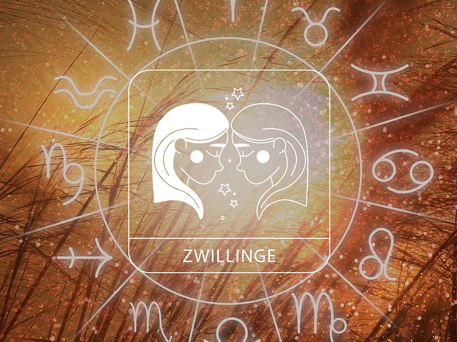 Sternzeichen Zwillinge in einem Astrologie-Kreis vor einem herbstlichen Hintergrund
