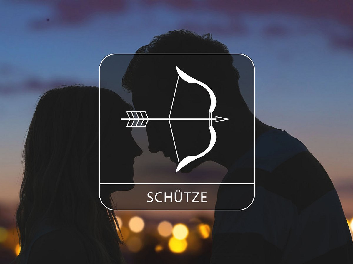 Sternzeichen Schütze vor einem Hintergrund mit einem verliebten Paar
